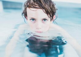 child, swimming, boy, little boy, clear water, fun, kid, leisure, little, water, wet, nature, swim, swimming pool, pool, blue eyes, youth, childhood, portrait, boy portrait