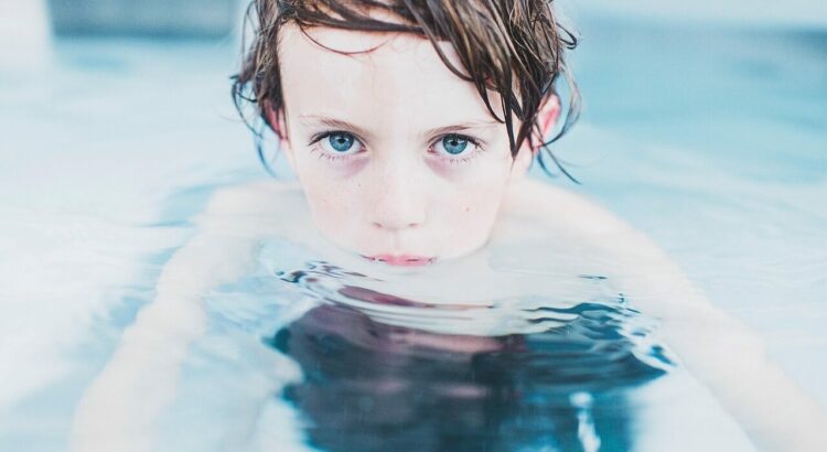 child, swimming, boy, little boy, clear water, fun, kid, leisure, little, water, wet, nature, swim, swimming pool, pool, blue eyes, youth, childhood, portrait, boy portrait
